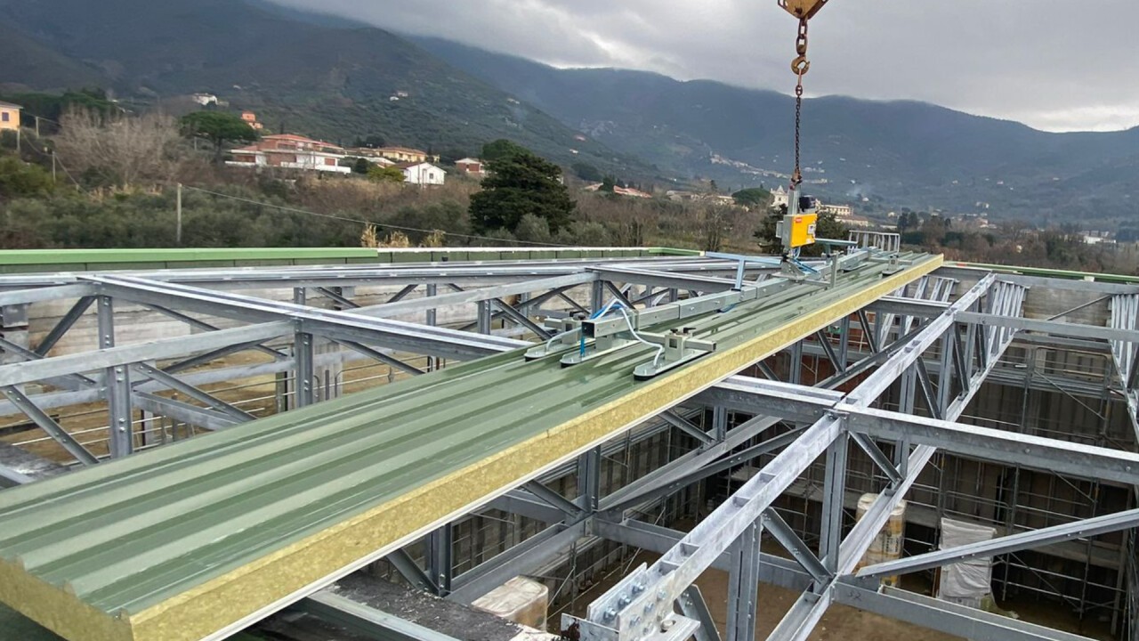 CL1 during the installation of a long roof insulated panel