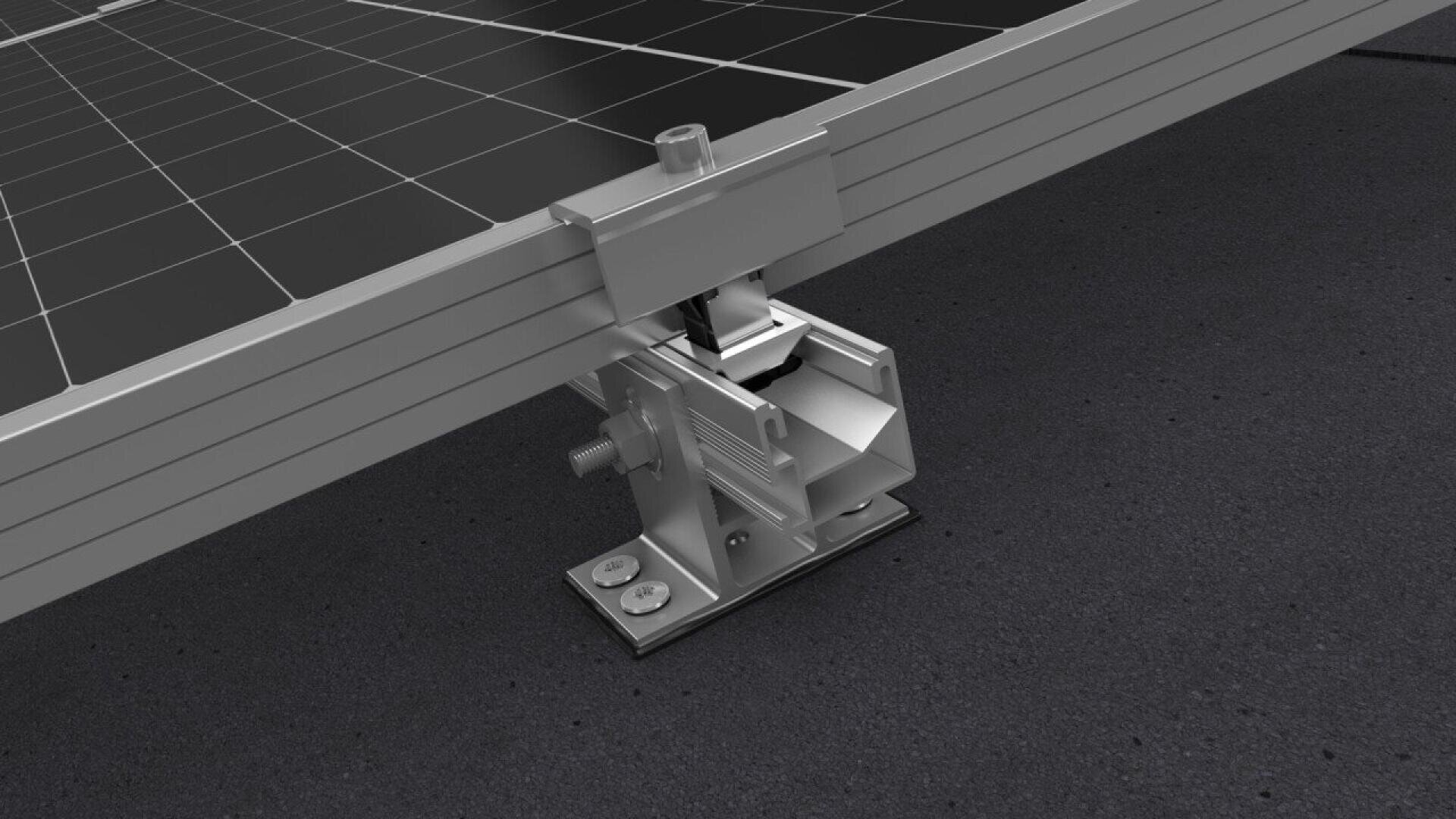 Close-up of a metal mounting bracket securing the corner of a solar panel to a flat, dark surface with bolts. The image highlights the connection and support hardware used in solar panel installations.