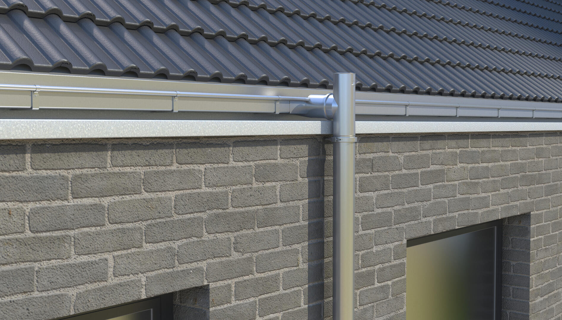 Nahaufnahme der Außenecke eines Gebäudes mit grauen Ziegelwänden, dunklen Dachziegeln, einer Regenrinne aus Metall und einem vertikalen Fallrohr zum Ableiten von Wasser vom Dach.