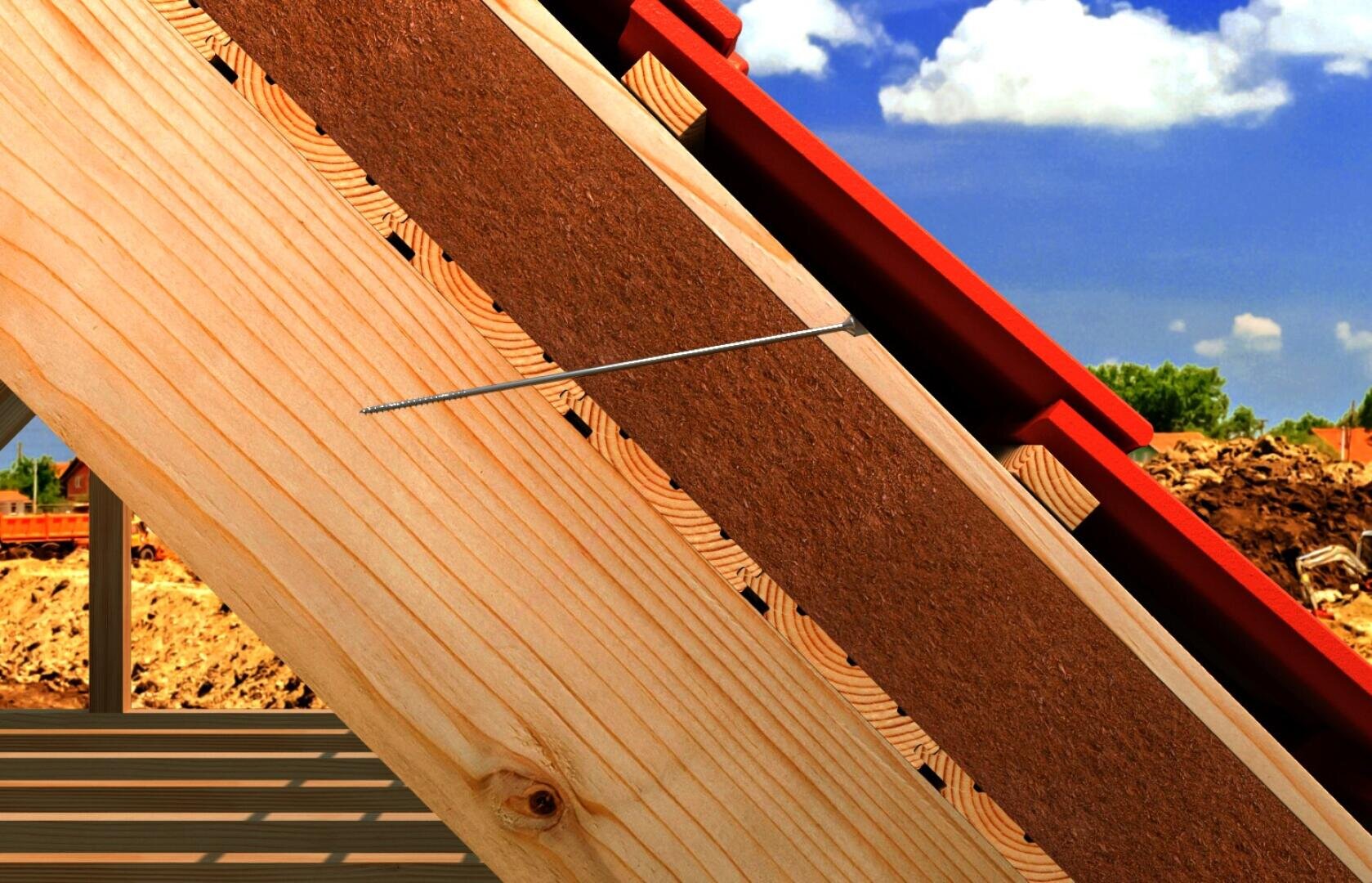 Close-up of a wooden roof structure under construction, showing beams, insulation and a thin metal rod. The sky is blue with some clouds, and building materials can be seen in the background.