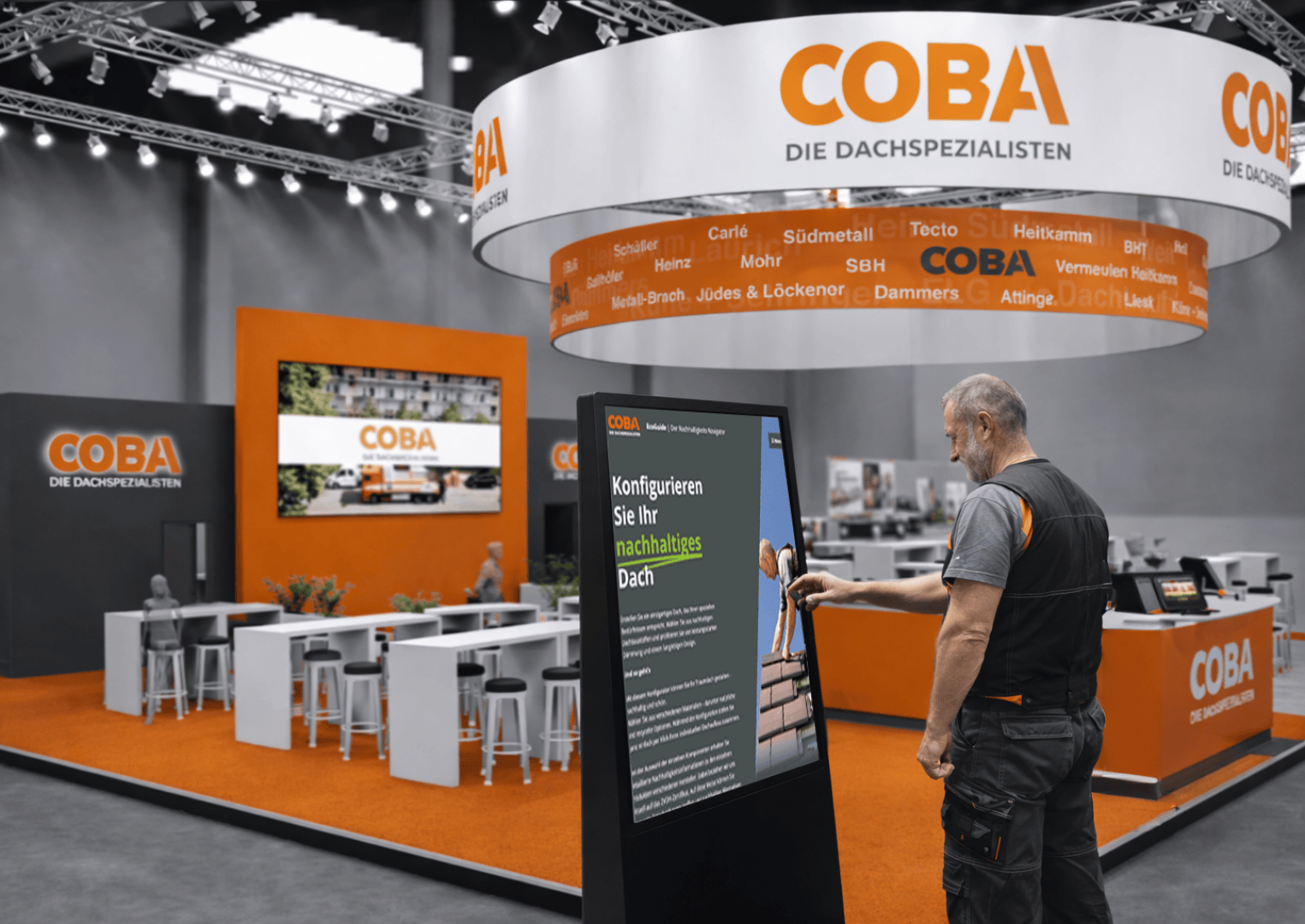 A man interacts with a touchscreen display at an exhibition stand for COBA, a roofing company. The stand features orange and gray branding, seating areas and large COBA logos on signs and banners.